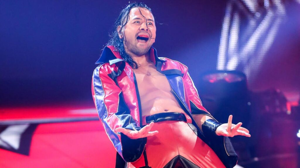WWE Superstar Shinsuke Nakamura makes his entrance to a wrestling ring
